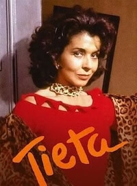 Tieta cover, a 1989 Brazilian telenovela, with the heroine in a red dress and the title in orange letters